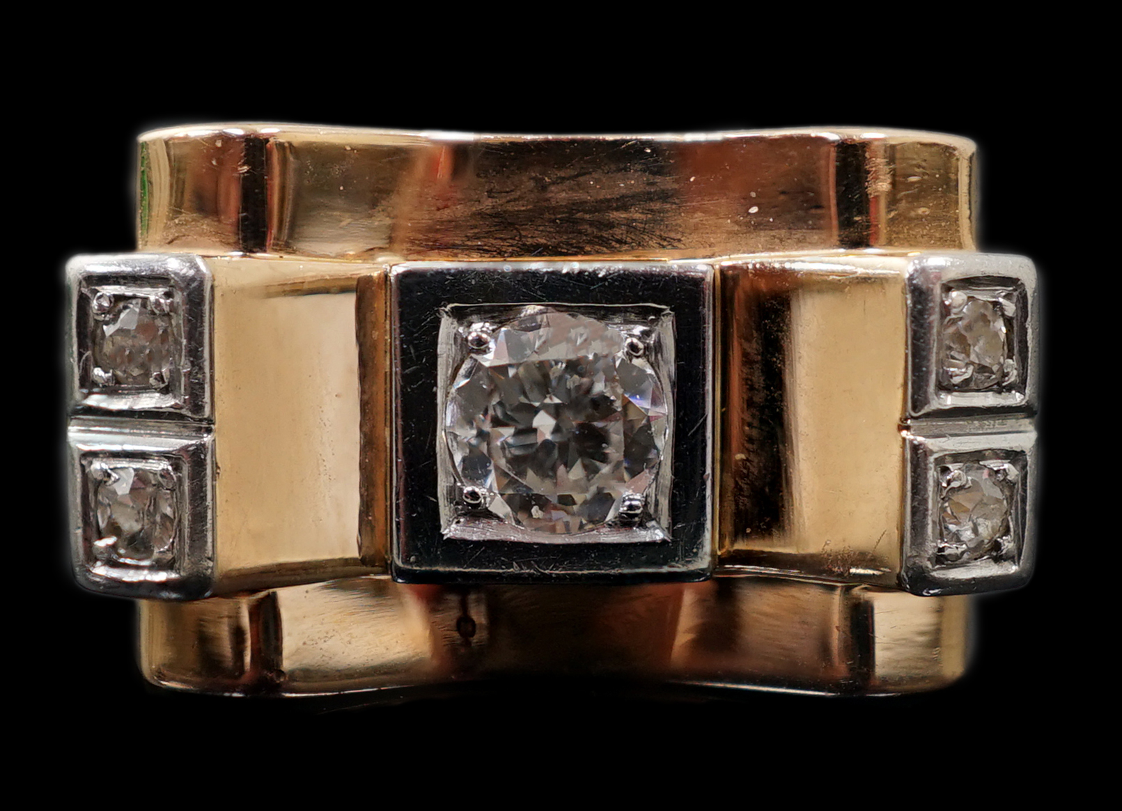 A 1940's 18ct gold and four stone diamond set 'tank' dress ring